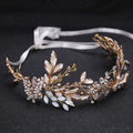 Elegant handmade hairband gold leaf headdress with delicate leaves, sparkling crystals, and soft white satin ribbon