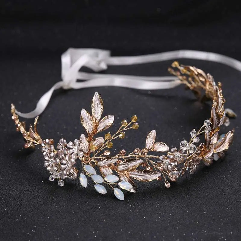 Elegant handmade hairband gold leaf headdress with delicate leaves, sparkling crystals, and soft white satin ribbon