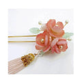 Handmade hanfu hairpin featuring a delicate pink floral design with pearl accents and a gold-toned pink floral tassel