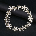 Delicate gold-toned handmade pearl twisted bead headwear featuring white pearl flowers and teardrop-shaped pearls