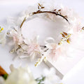 Handmade white rose bridal veil featuring a floral wreath with elegant white and blush flowers lace and dried accents