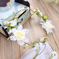 Handmade white rose bridal veil with delicate white floral wreath featuring artificial roses green leaves and berries