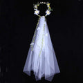 Handmade white rose bridal veil with delicate floral wreath featuring white flowers embroidered with green vines and sheer veil