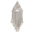 Cream-colored handwoven home decor triangle dream catcher with intricate macrame patterns and cascading dream catcher tassels