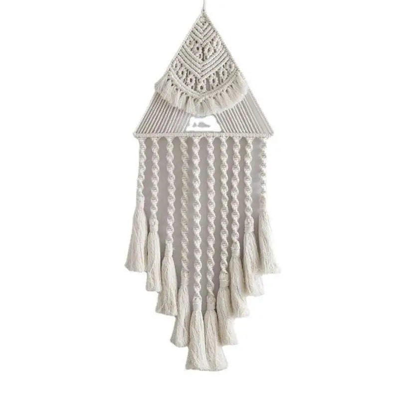 Cream-colored handwoven home decor triangle dream catcher with intricate macrame patterns and cascading dream catcher tassels