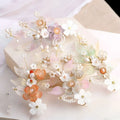 Hanfu ancient style handmade fringed floral hair crown with delicate pastel petals, pearl accents, and gold centers