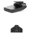 Black plastic hd driving recorder with foldable suction cup mount and front camera lens for vehicle use