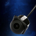 Black plastic hd perforated rear view car camera with silver metal mounting bracket and attached black cable shown from back side