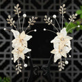 Elegant ivory shell flower bride Chinese luxury hairpins with gold-toned jade leaves and pearl accents for weddings