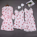 Pink and red heart printed women’s silk slip nightdress with lace trim and satin pajama set