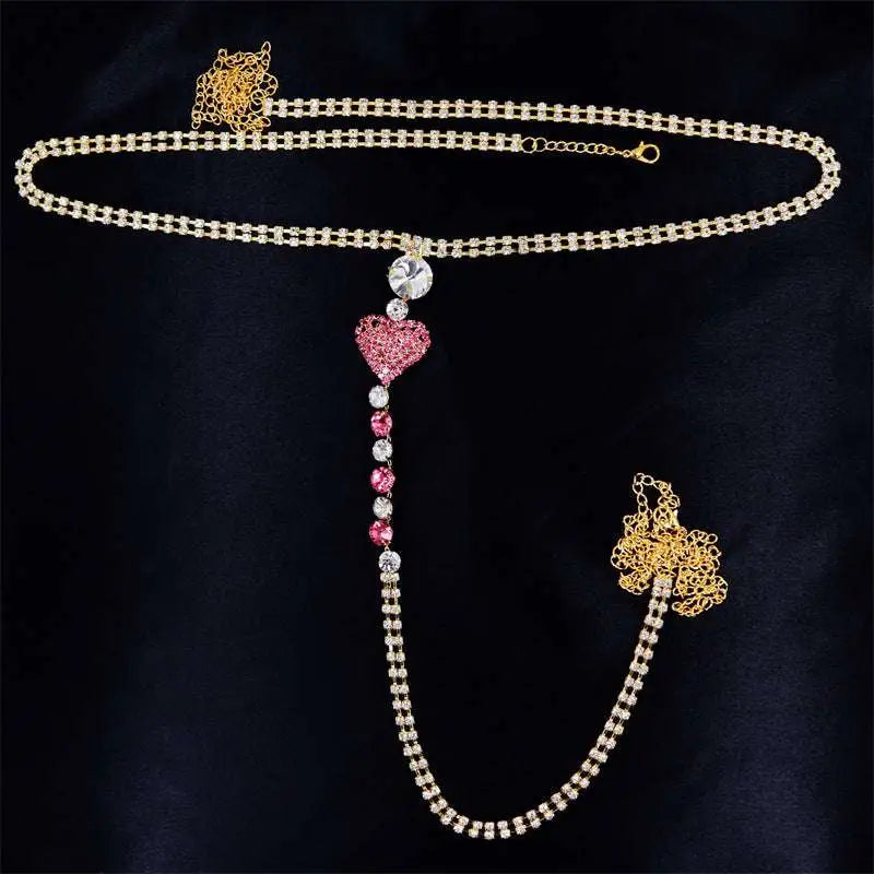 A sparkling gold rhinestone panty body jewelry with pink heart pendant and garter belt featuring floral charms