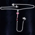 A sparkling silver rhinestone panty body jewelry with a pink heart pendant and garter belt beads
