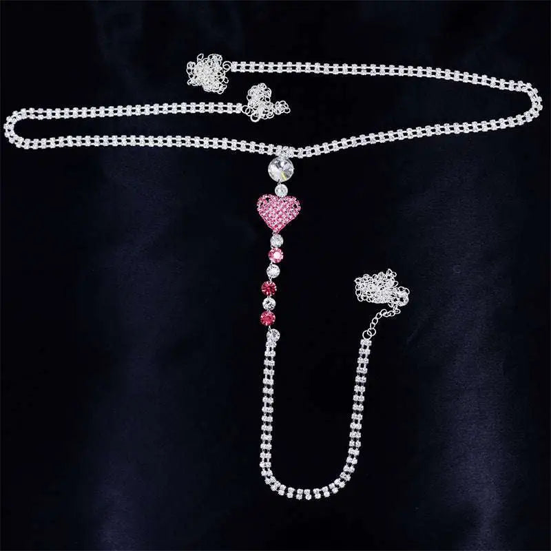 A sparkling silver rhinestone panty body jewelry with a pink heart pendant and garter belt beads