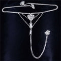 Silver rhinestone panty body jewelry with heart-shaped centerpiece crystal drops and matching garter belt detail