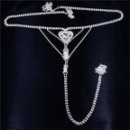 Silver rhinestone panty body jewelry with heart-shaped centerpiece crystal drops and matching garter belt detail
