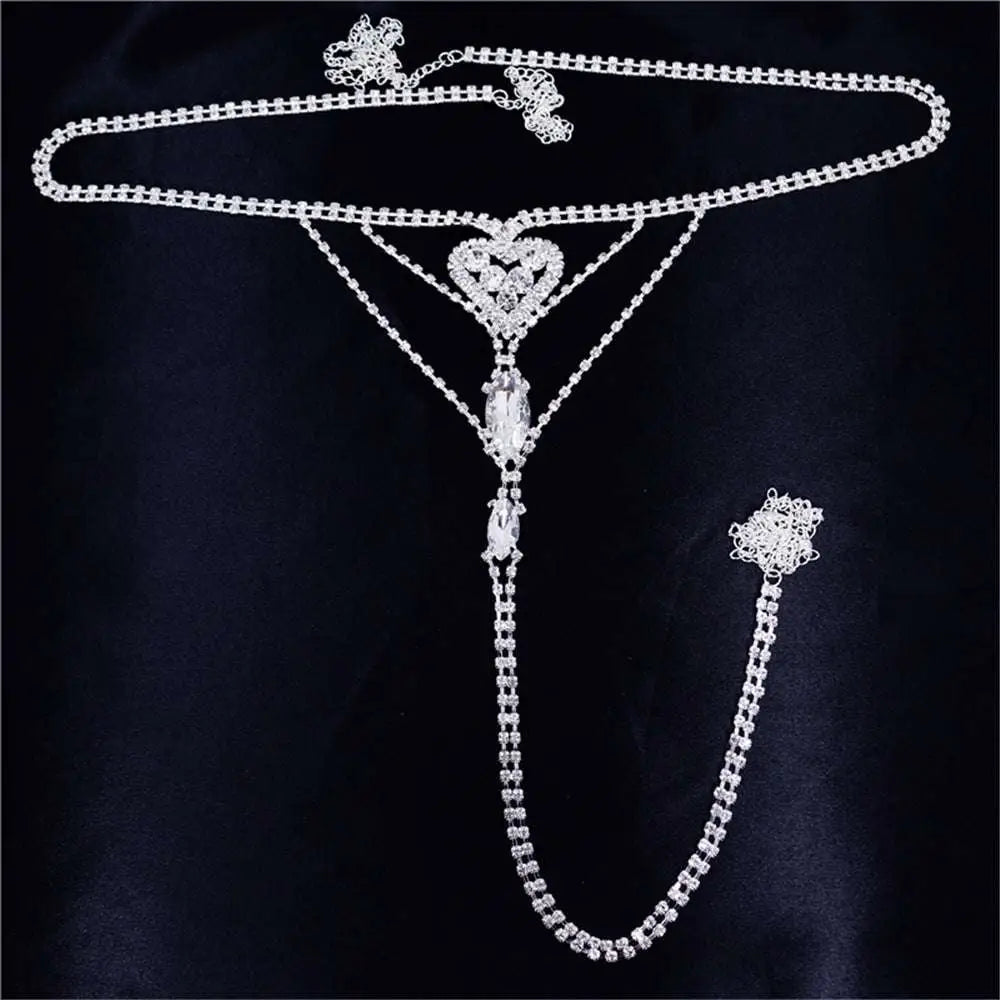 Silver rhinestone panty body jewelry with heart-shaped centerpiece crystal drops and matching garter belt detail