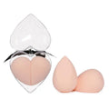 Heart shaped beauty egg makeup sponges in peach silicone in a clear glittery heart case with black ribbon gift box