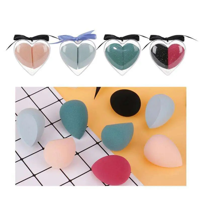 Colorful heart shaped beauty egg makeup sponges in pastel shades with glittery finishes and solid colors in gift box