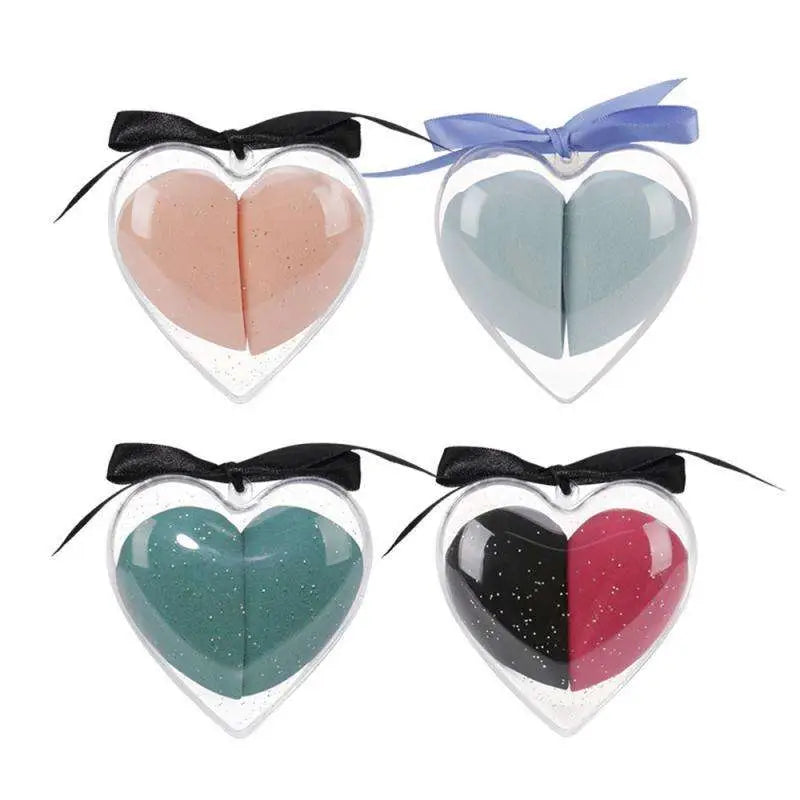 Heart shaped beauty egg makeup sponge gift box with glittery two toned silicone pads and satin ribbon bows in clear cases