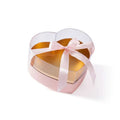 Heart shaped transparent flower packing box with a translucent top pink base and light pink satin ribbon bow