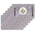 Heat resistant textured gray dining table placemats with subtle woven pattern for durable dining table use