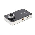 Black and silver hidden type dash cam with circular front lens 3 inch screen and suction cup mount for data storage capability