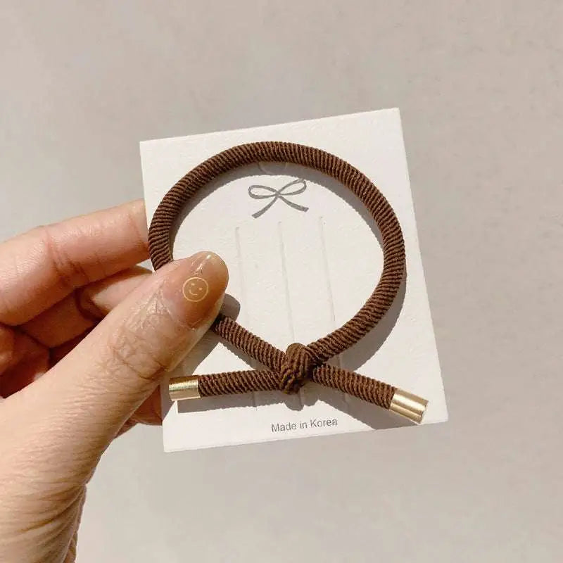 Brown braided wrist hair tie with gold metal ends for secure hair styling high elasticity 5 pack