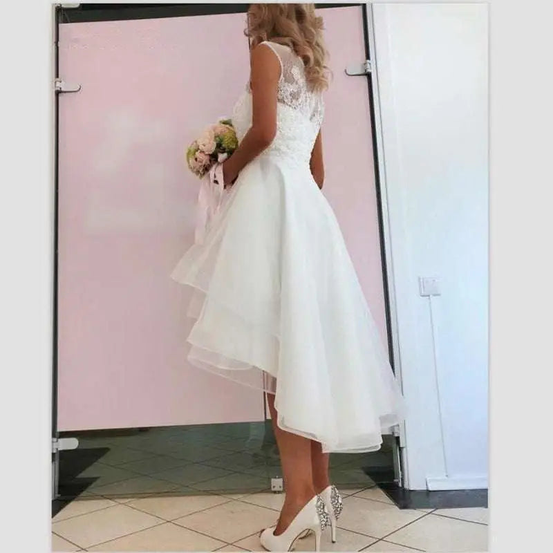 White lace and tulle short wedding dress with high low lace hemline style wedding dress design
