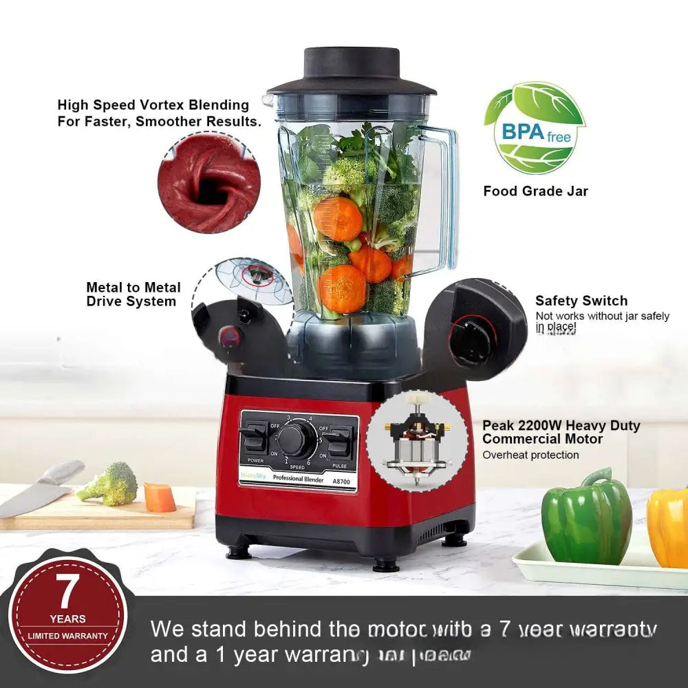 Red and black peak professional royale essence lux high-power commercial blender with clear food-grade jar filled with vegetables