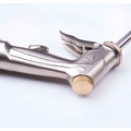 Stainless steel high pressure power washer spray nozzle with gold brass adjustment knob and anchor logo for pressure cleaning