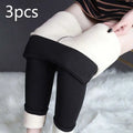 Black winter leggings with plush white fleece lining and rolled cuffs by royale essence lux for warmth and stretch