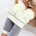 Cream-colored high stretch winter leggings with fleece lining and gray elastic cuffs by royale essence lux