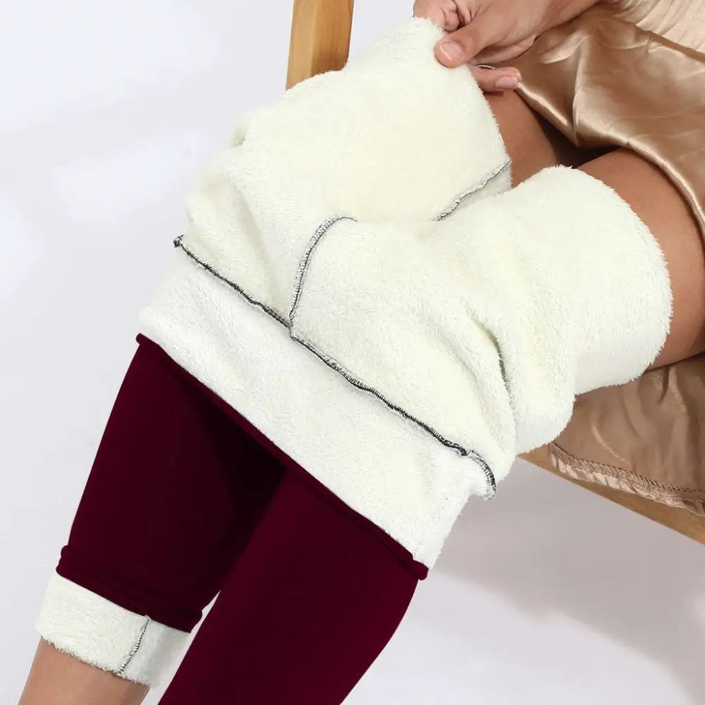 Cream-colored high stretch winter leggings with fleece lining and dark contrast stitching by Royale Essence Lux