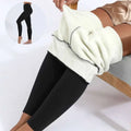 Black winter leggings with plush white fleece lining and black hem stitching by royale essence lux