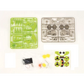 Green and clear plastic trays with mechanical parts and decals for assembly of high tech diy solar powered dinorobot kit