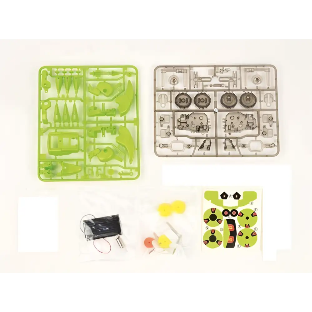 Green and clear plastic trays with mechanical parts and decals for assembly of high tech diy solar powered dinorobot kit