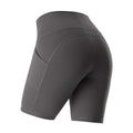 Dark gray high waist fitness athletic yoga pants with sleek form-fitting design and convenient side pockets