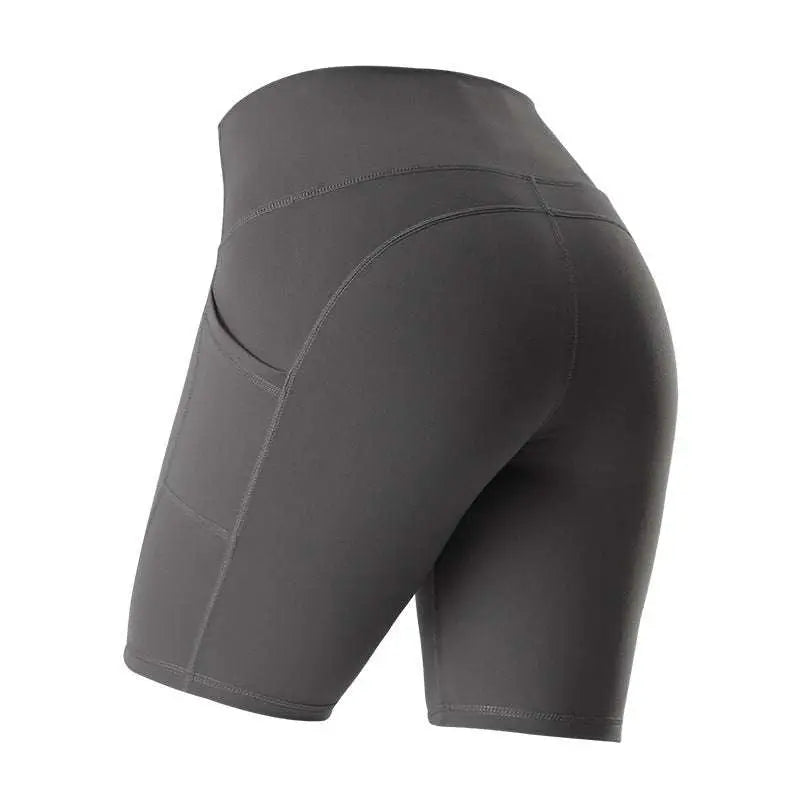 Dark gray high waist fitness athletic yoga pants with sleek form-fitting design and convenient side pockets