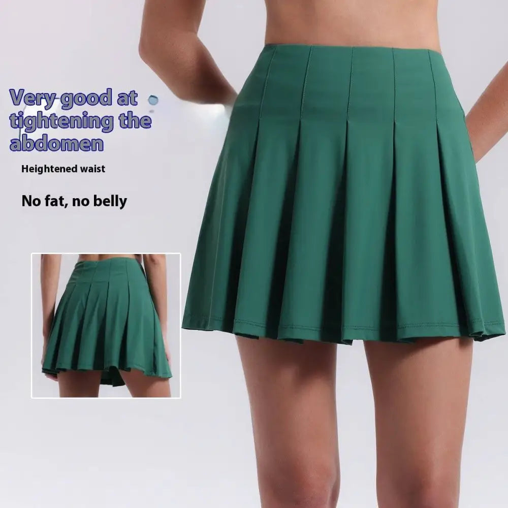 A vibrant green pleated skirt with safety hem and side pocket designed for fitness yoga exercise and aerobics high waist use