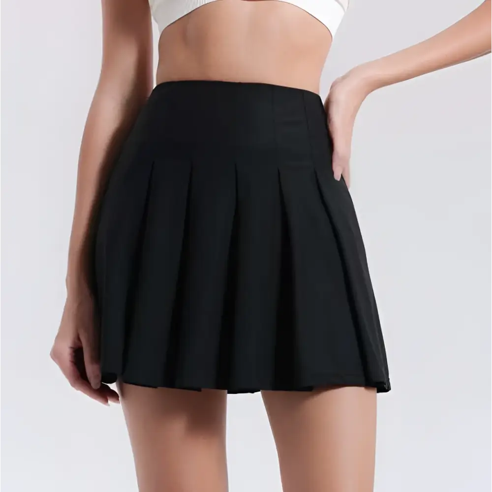Black pleated skirt high waist design with smooth structured fabric ideal for fitness yoga exercise and aerobics