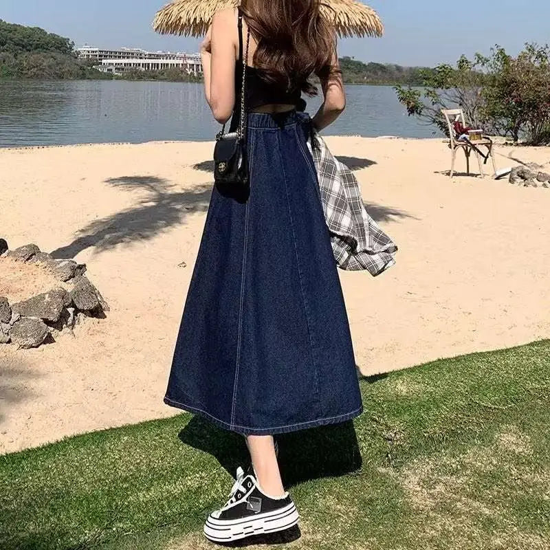 Dark blue high waist flared denim skirt women’s mid-length with a straight cut and durable denim material