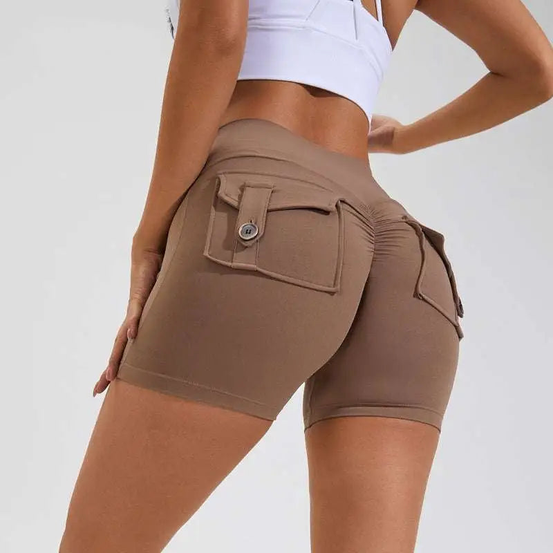 Tan high waist hip lifting shorts with ruched back and button pocket closures for workout and casual wear