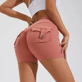 Back view of pink high waist hip lifting shorts with buttoned pocket designed for athletic use