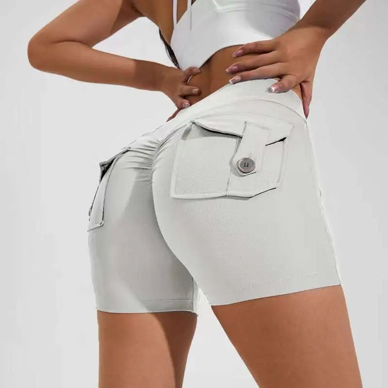 Light gray high waist hip lifting shorts with stretchy fabric and a buttoned flap pocket on the back side