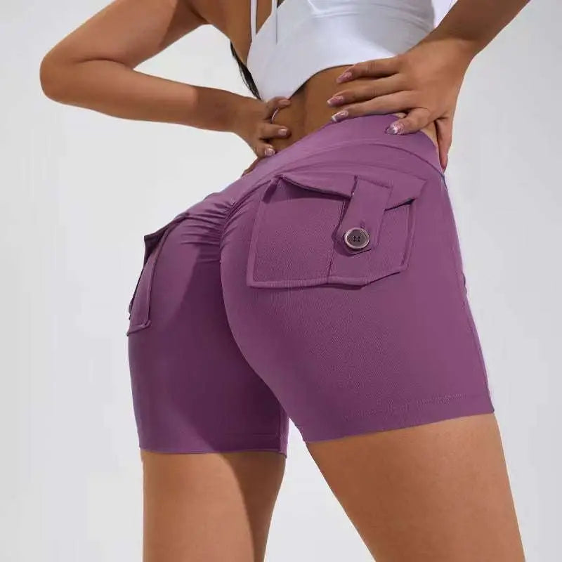 Purple high waist hip lifting shorts with elastic waistband and buttoned pocket for secure storage during workouts