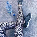 Black and white high waist leopard print leggings showcasing bold waist leopard print pattern for stylish wear