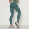 Teal heathered high waist leggings with black accent stripes designed for peach hip yoga and athletic wear