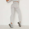 Light gray heathered high waist leggings with sheer panel design for peach hip yoga and athletic wear