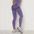 Purple textured high waist peach hip yoga pants with subtle darker purple accent stripes for activewear use