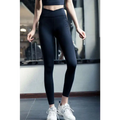 Black high-waisted leggings with sleek design and subtle side pockets in cotton blend for pink yellow yoga set use